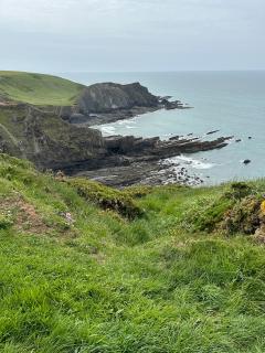 Upon rounding the point the landscape changes with some dramatic rock formations in evidence